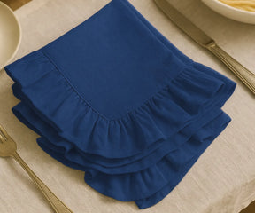 Navy blue cotton ruffle edge dinner napkins, reusable and absorbent cloth napkins for weddings, parties, special celebrations, and everyday dining table décor.