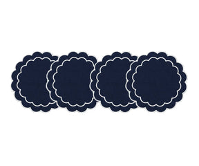 Embroidered round placemats with a scalloped edge for an elegant and inviting tablescape
