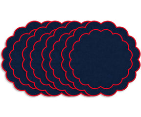 Decorative cotton table placemat with a round shape, scalloped edge, and embroidery for dining and festive entertaining
