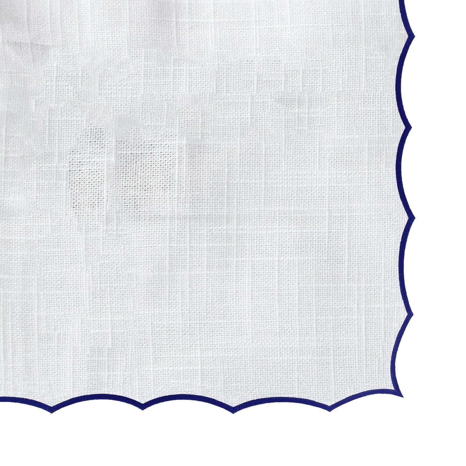 Navy blue and white cloth tablecloth with scalloped edge design, perfect for dining, banquets, and everyday use.