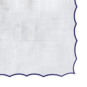 Navy blue and white cloth tablecloth with scalloped edge design, perfect for dining, banquets, and everyday use.