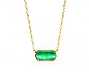 Green stone pendant necklace on gold-plated chain with extender.