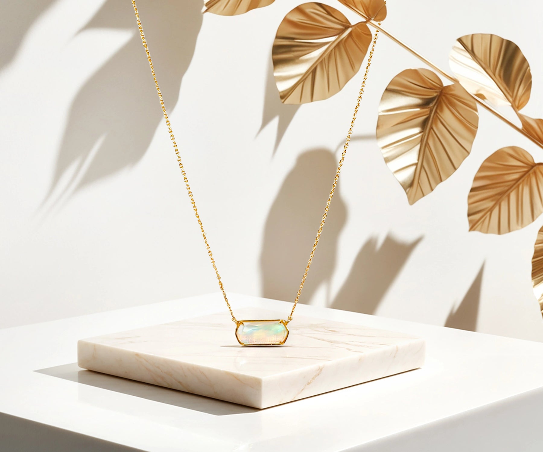 Timeless opal pendant necklace with adjustable chain.