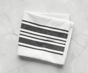 Stylish hand towels with a classic stripe pattern.