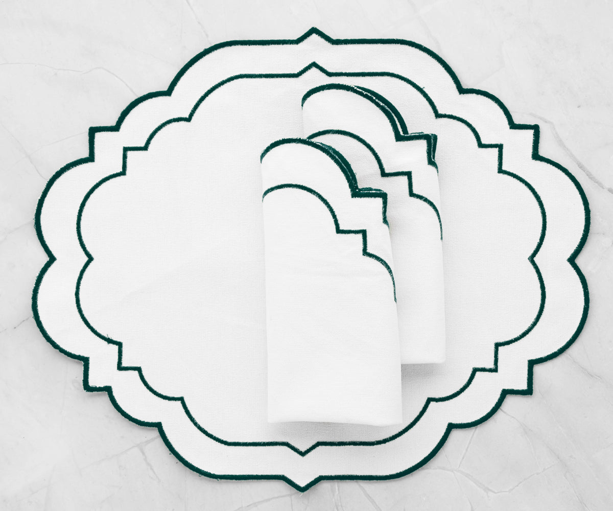 Elegant green placemats for a sophisticated table setting.