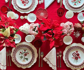 Scalloped edge napkins crafted with intricate detailing for refined table settings.