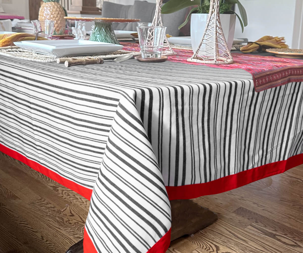 A red and white tablecloth typically features a classic combination of red and white colors in stripe patterns 