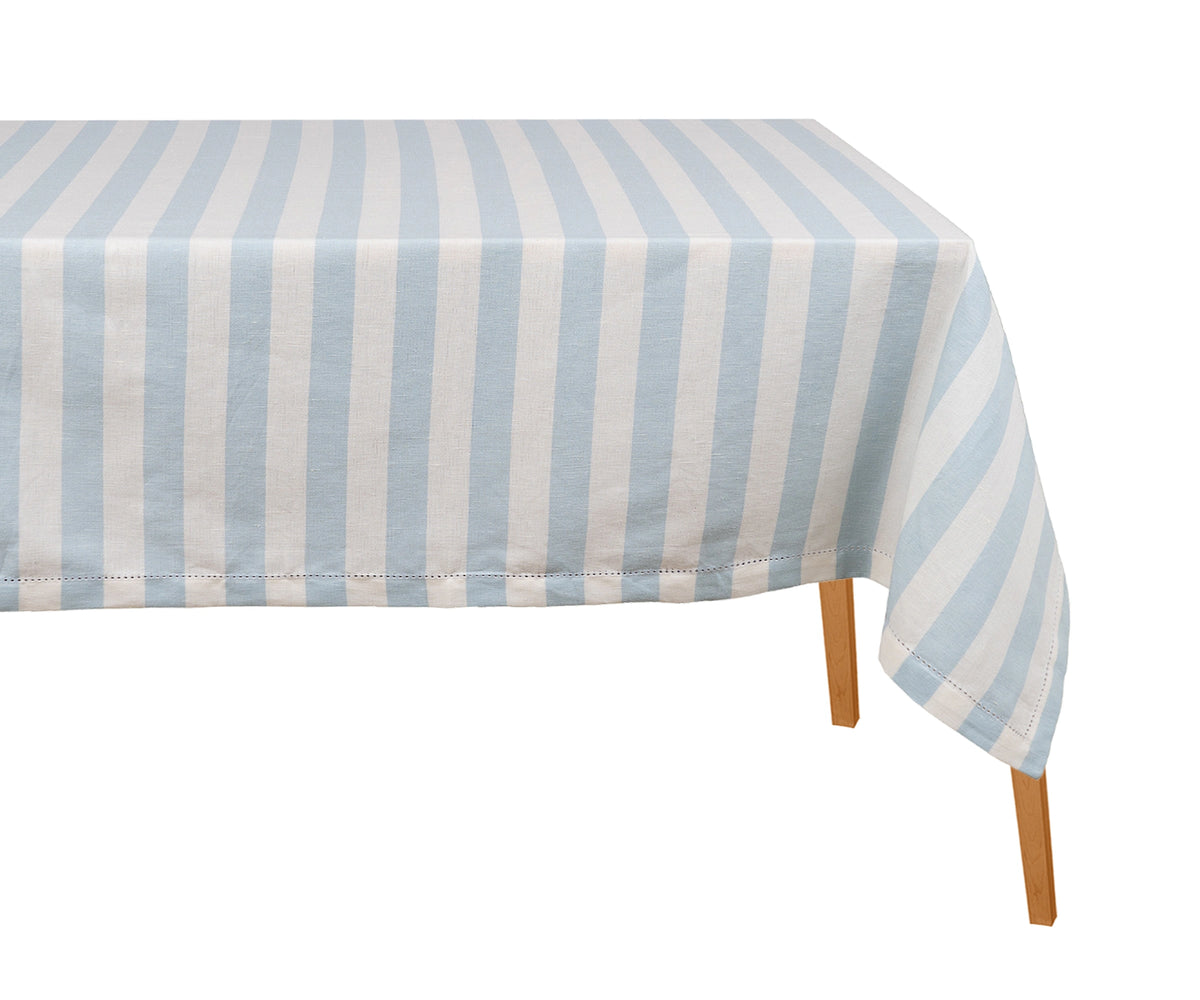 A blue and white striped cotton hemstitched tablecloth designed as a casual dining table cover.
