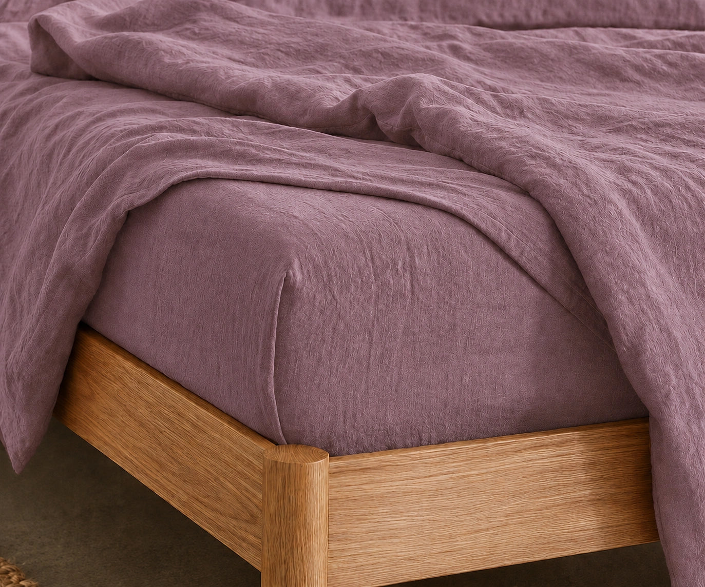 Organic linen bedding in dusty mauve for breathable and eco friendly sleep comfort