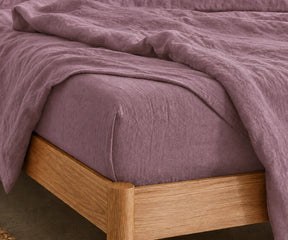 Organic linen bedding in dusty mauve for breathable and eco friendly sleep comfort