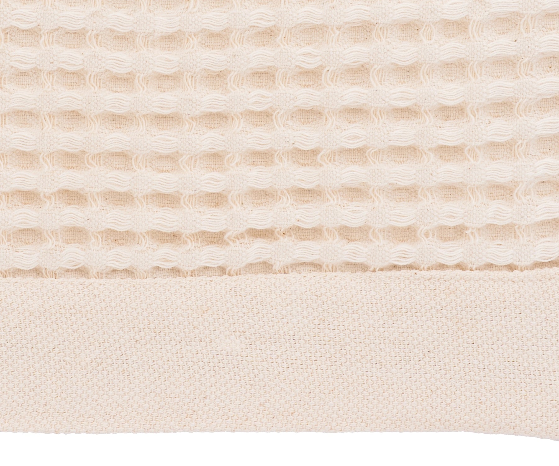 Organic natural waffle blanket styled for a warm and minimalist home décor.