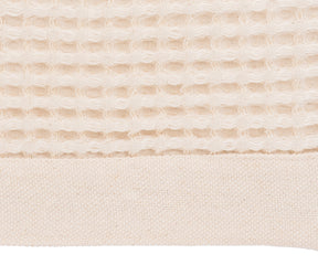 Organic natural waffle blanket styled for a warm and minimalist home décor.