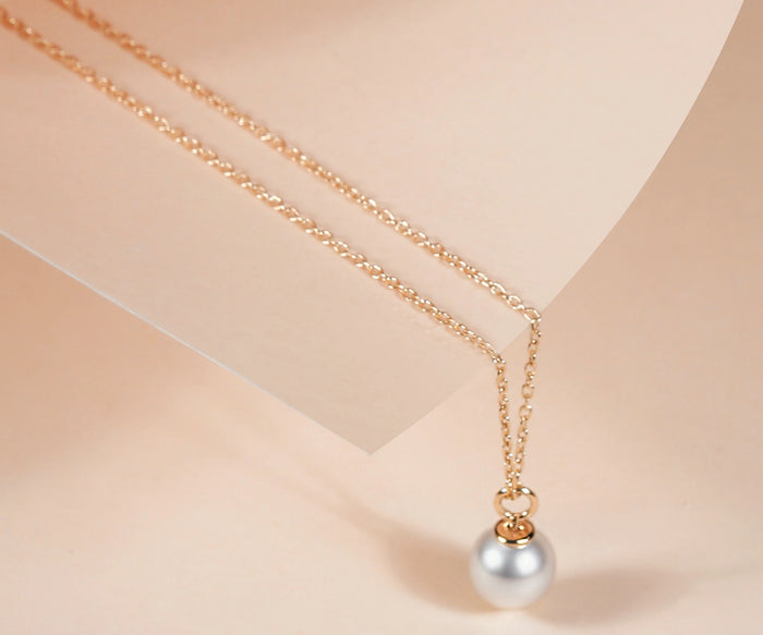 Freshwater pearl pendant necklace gift for her elegant June birthstone jewelry on neutral background