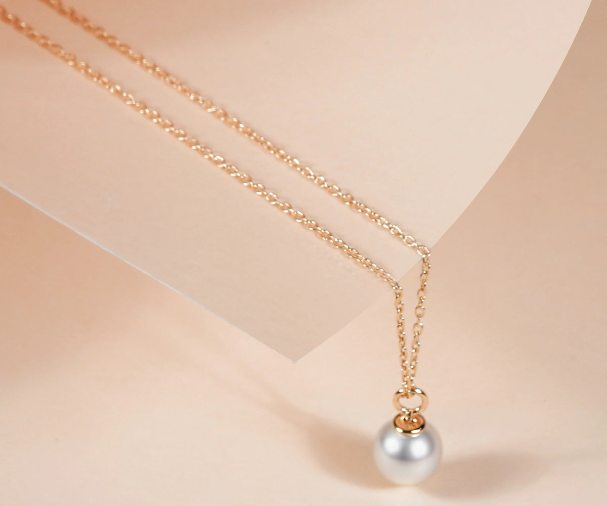 Freshwater pearl pendant necklace gift for her elegant June birthstone jewelry on neutral background