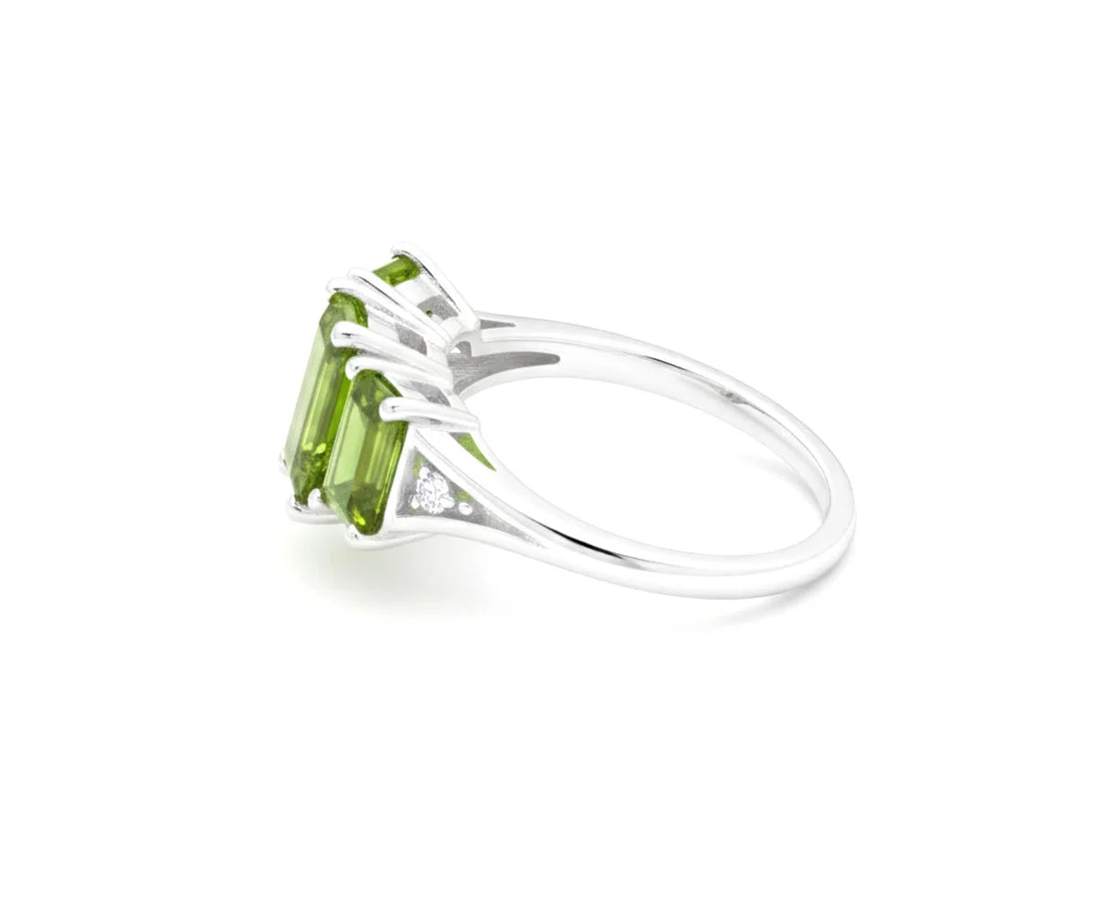 Peridot and zircon ring with green gemstone and fine detailing