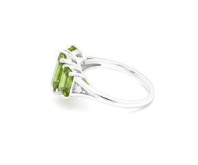 Peridot and zircon ring with green gemstone and fine detailing