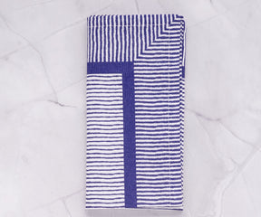 Use blue striped napkins to create a coastal vibe at your next event