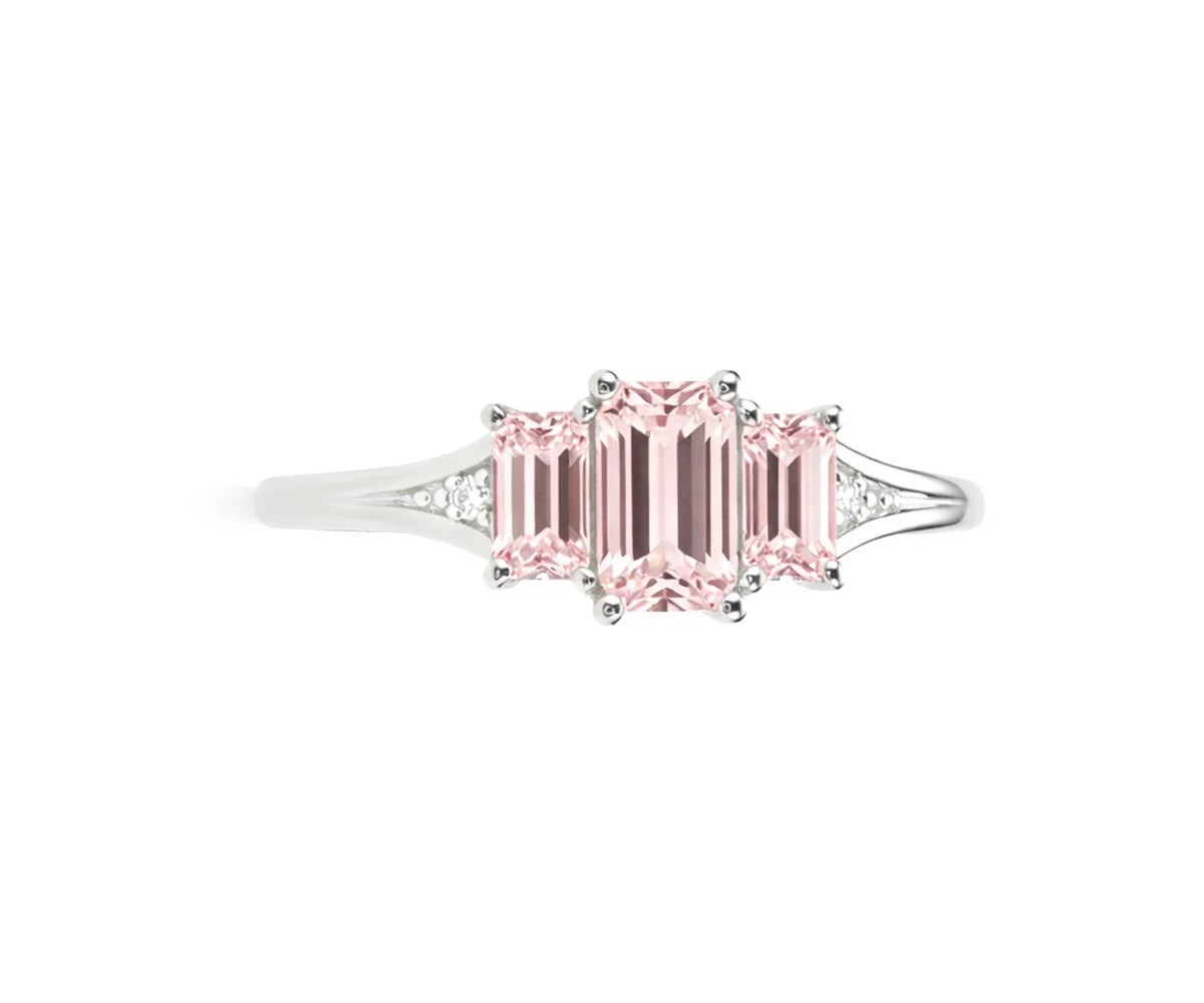 Rose quartz ring showcasing soft pink stone with zircon sparkle details