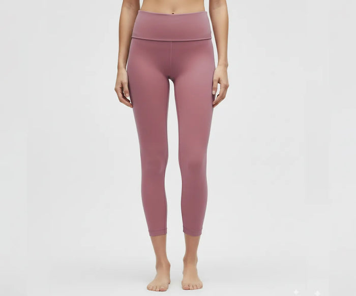High-waisted pink women's leggings for yoga, gym, and casual wear, breathable cotton blend with stretchy, supportive waistband.