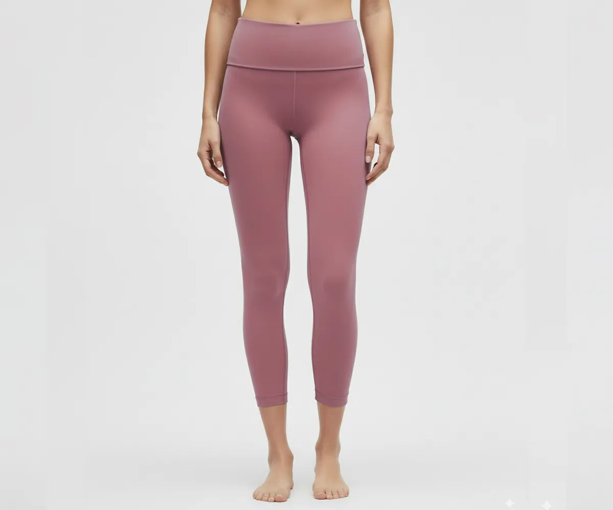 High-waisted pink women's leggings for yoga, gym, and casual wear, breathable cotton blend with stretchy, supportive waistband.