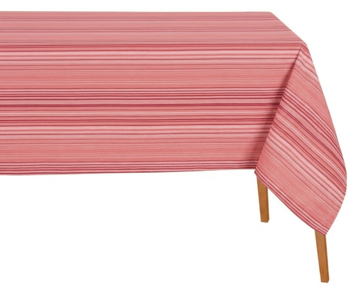 Pink multi stripe cotton tablecloth draped over rectangular dining table, decorative striped table cover for brunch and everyday dining