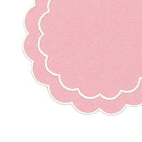 Round scalloped placemats with decorative embroidery for everyday meals and entertaining