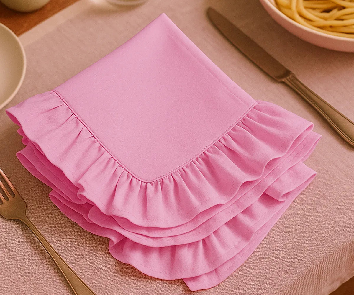 Set of blush pink ruffled cloth napkins made from 100% cotton, washable and eco-friendly fabric napkins available in bulk or small sets, perfect for farmhouse, modern, or classic table settings.