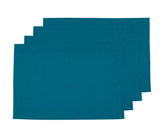 Set of teal linen placemats with a soft textured finish, neatly arranged on a dining table to add elegance, durability, and a stylish pop of color to everyday meals or special occasions.