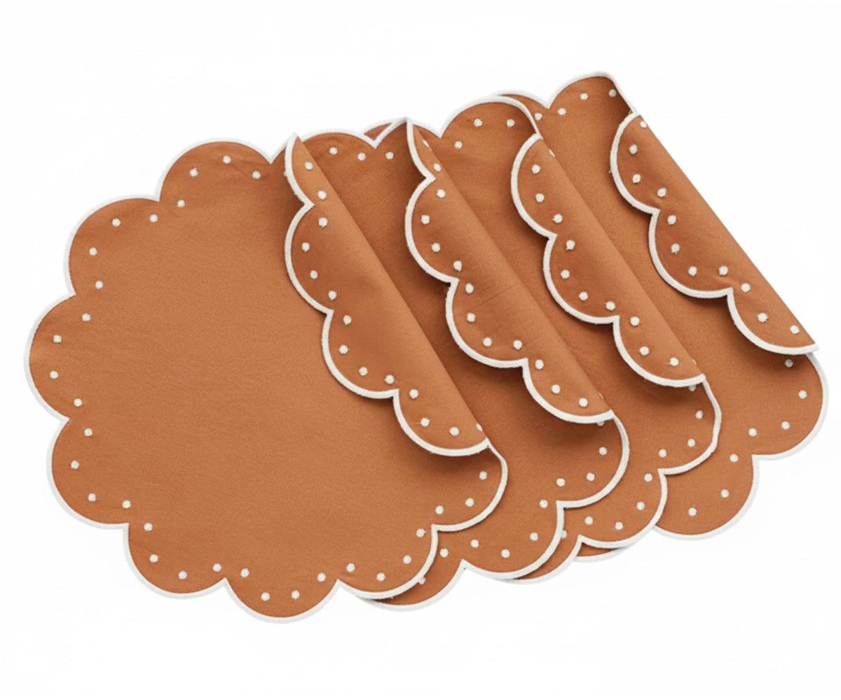 Terracotta cotton round placemats with decorative scalloped border for everyday dining
