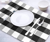 Set your dining table with black buffalo checkered placemats.