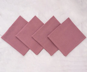 Cotton dinner napkins paired with striped tablecloth