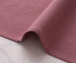 Dusty red cotton napkins in sizes 18 x 18, 20 x 20, 22 x 22 inches