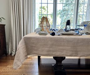  Grey linen tablecloth offering a classic and timeless look.