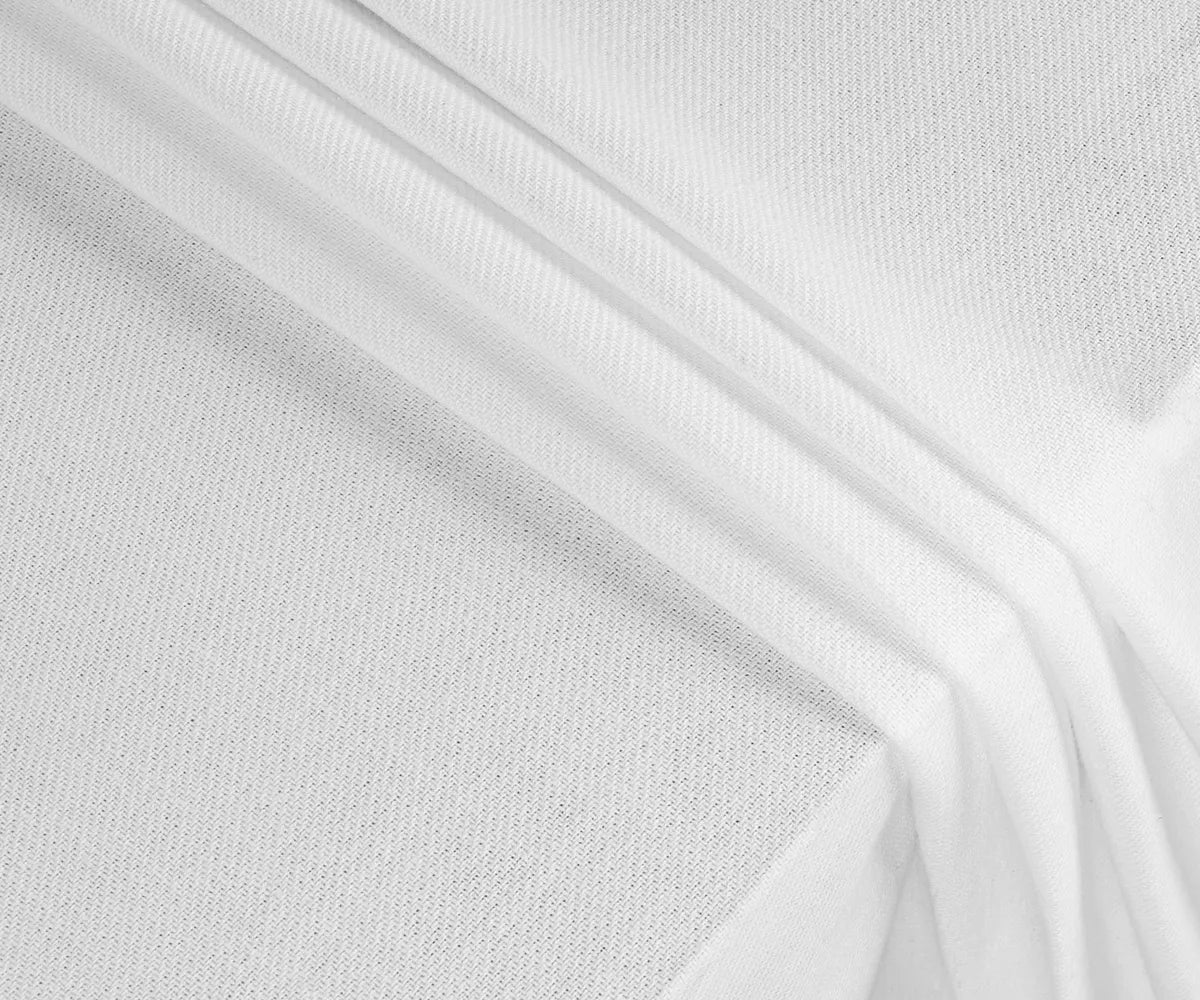 Soft, durable white cotton tablecloth in multiple sizes, perfect for formal occasions, casual family dinners, or outdoor picnics, adding effortless elegance.
