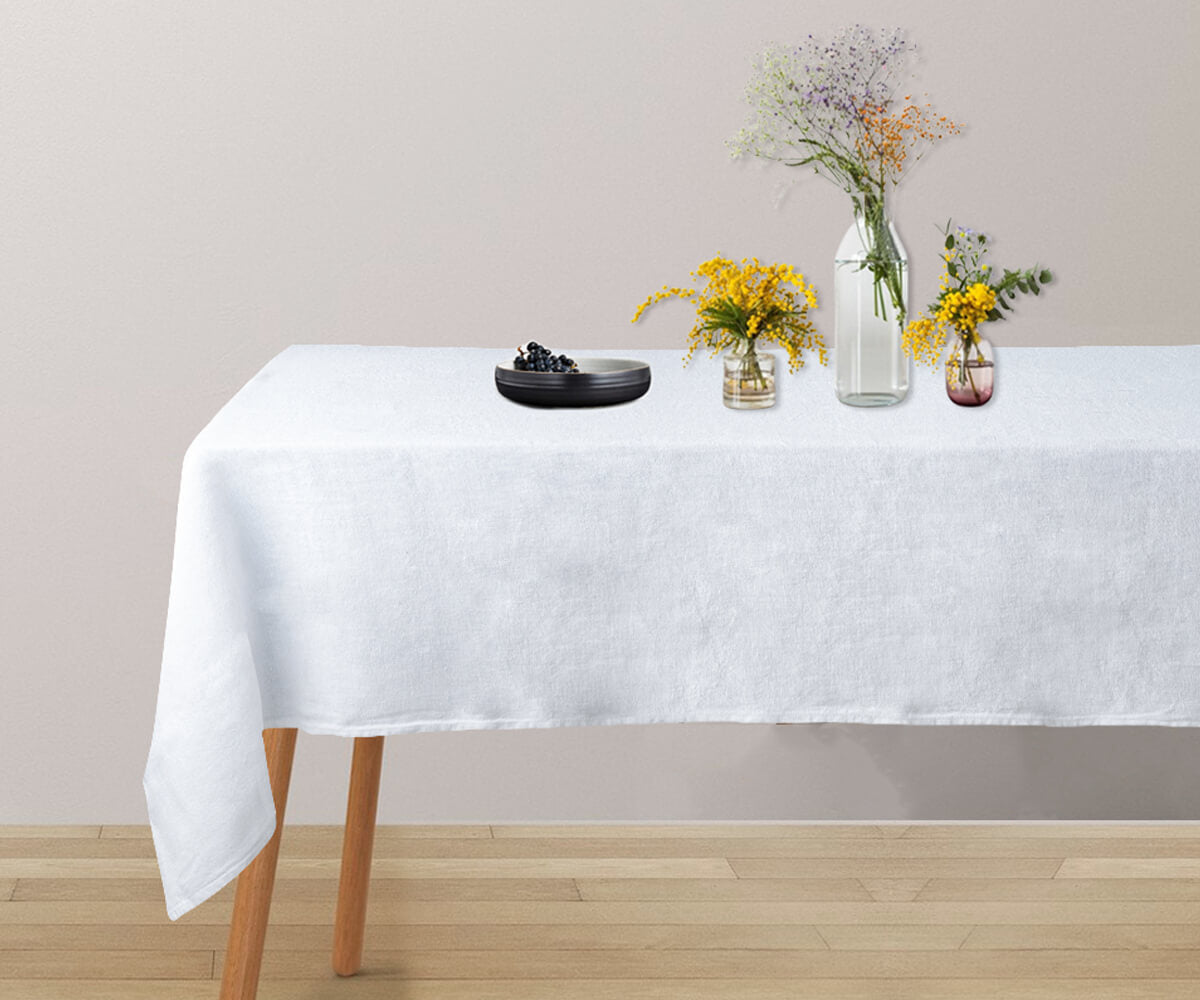 A pure white linen tablecloth for a touch of sophistication.