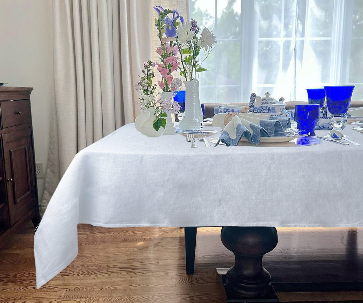 Explore the elegance of white linen tablecloths, including choices for rectangular tables, to enhance your table setting.