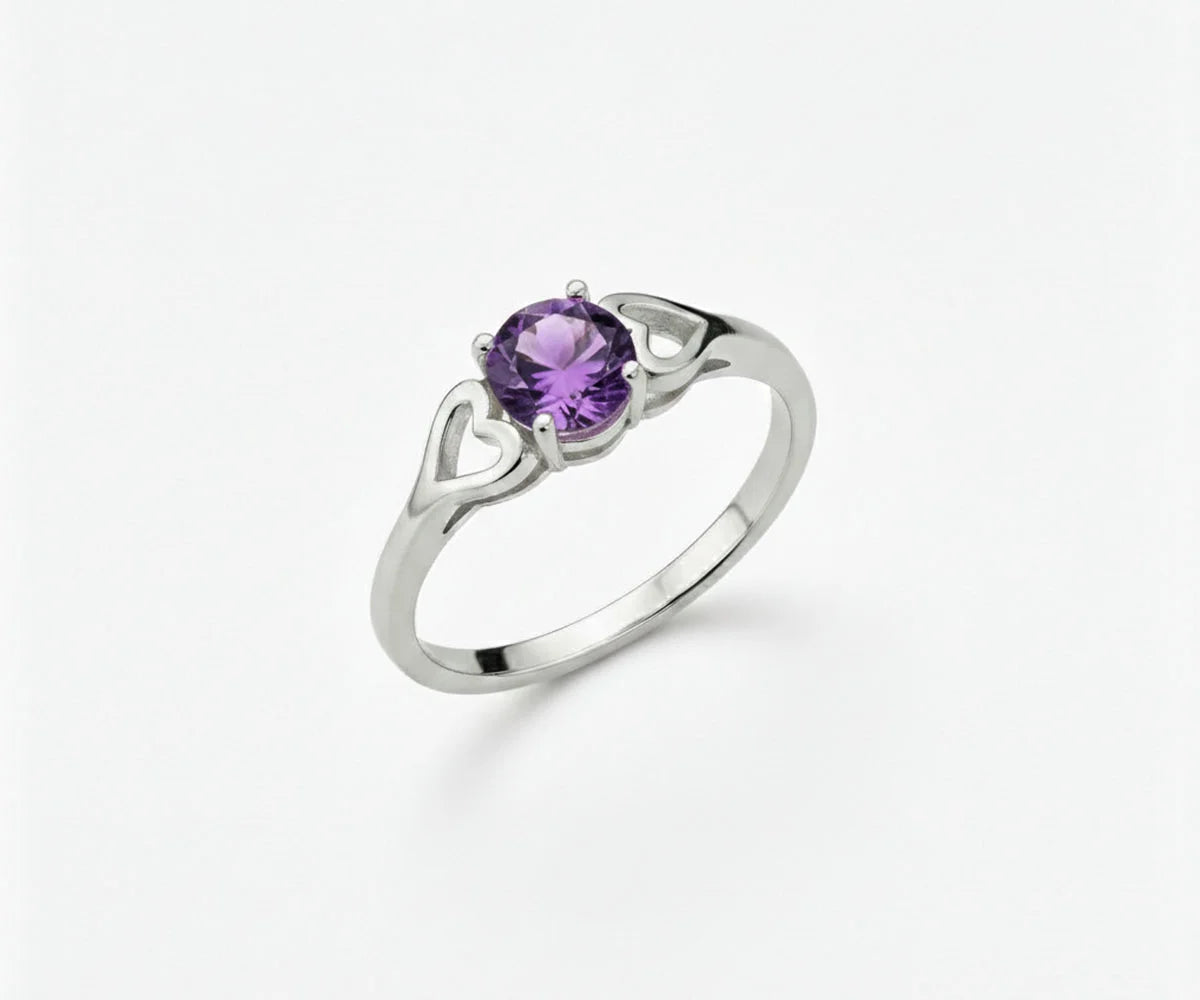 amethyst ring in a silver with vibrant purple gemstone