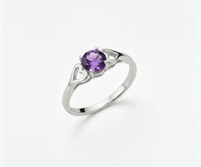 amethyst ring in a silver with vibrant purple gemstone