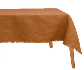 Burnt terracotta European linen tablecloth with pin-tucked border styled for wedding table setting and modern dining room decor
