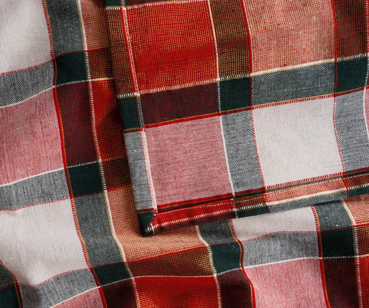 Cozy buffalo plaid cotton tablecloth on dining table for family gatherings and festive meals