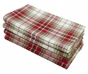Classic red plaid cotton napkins folded neatly beside matching red tartan tablecloth