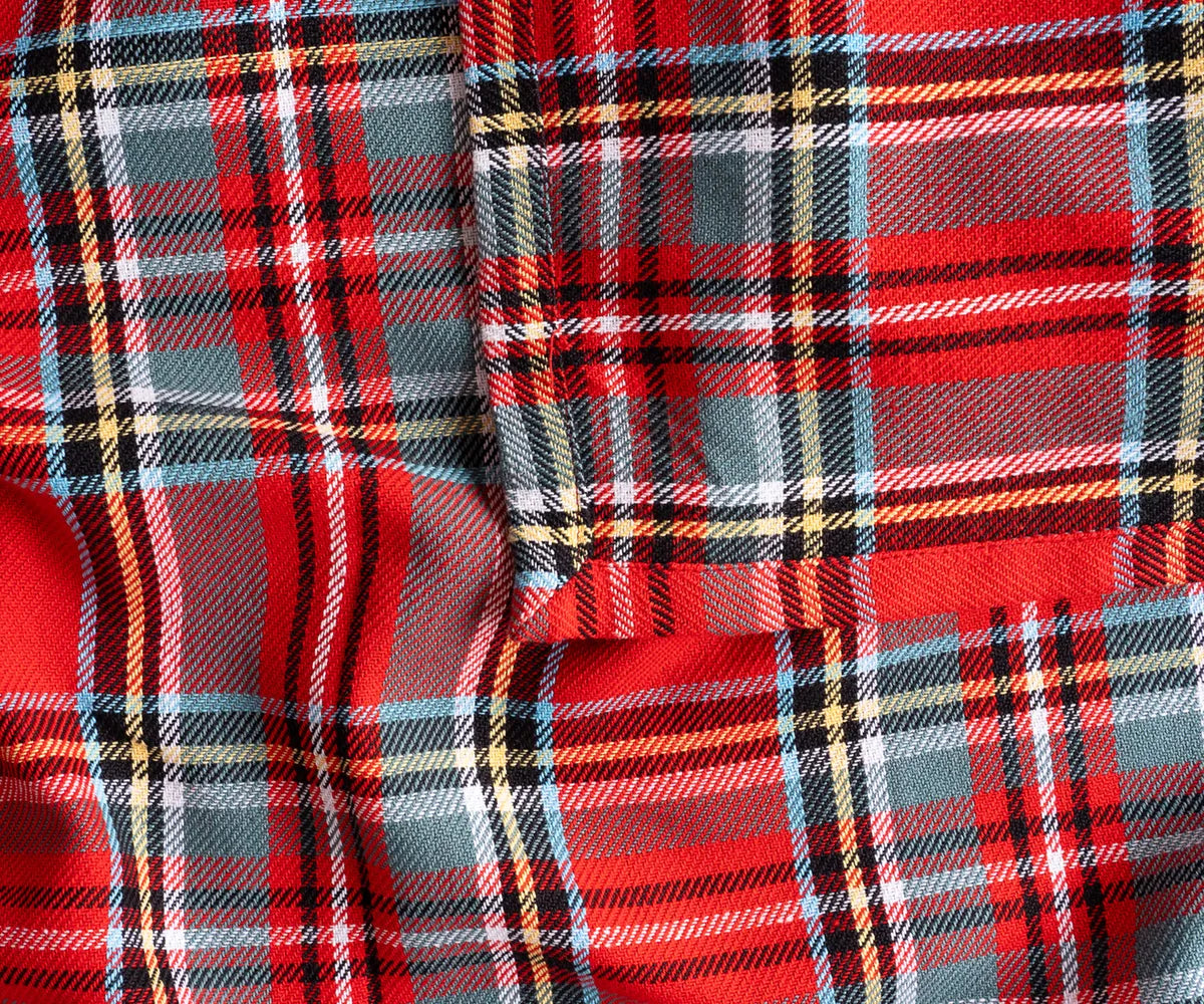 Elegant red tartan cotton tablecloth with navy and yellow accents for everyday dining decor