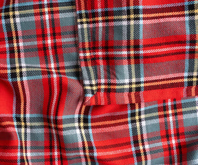 Elegant red tartan cotton tablecloth with navy and yellow accents for everyday dining decor
