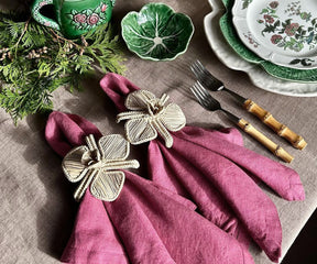 Fuchsia cloth napkins, are vibrant and chic, creating a festive and energetic ambiance.