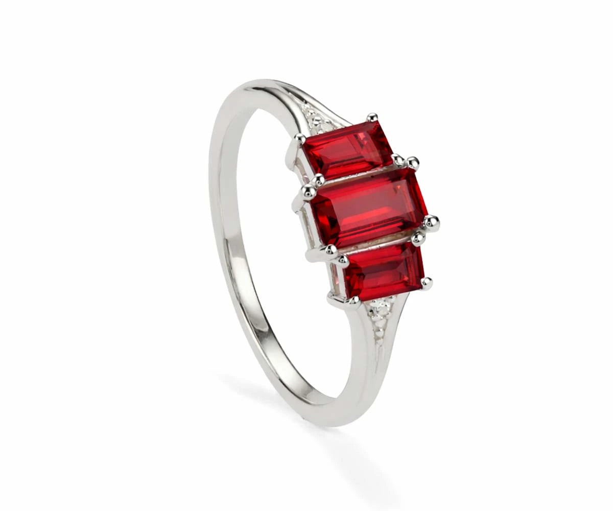 Ruby ring with white zircon stones in elegant design