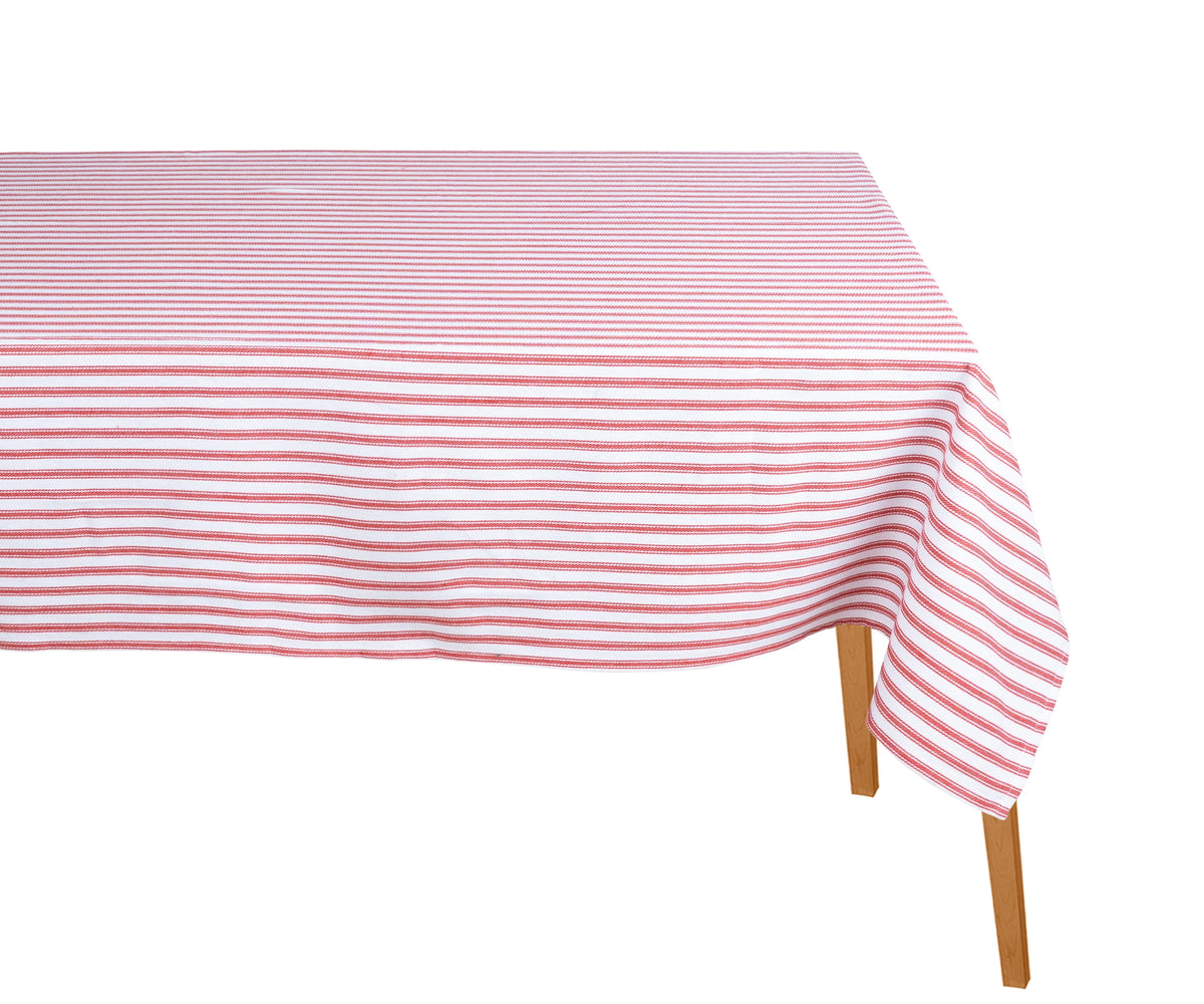 Red and white striped rectangular cotton tablecloth on a dining table