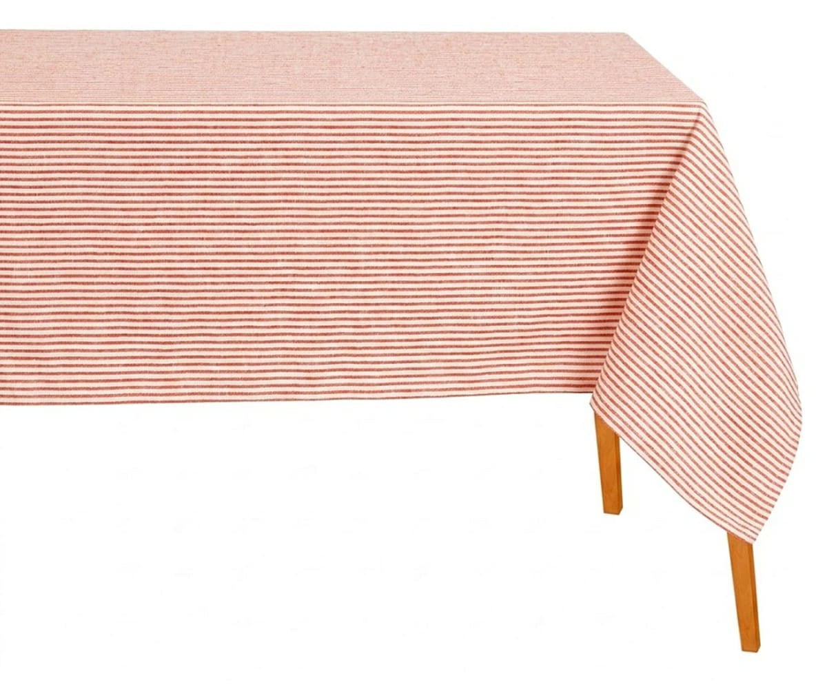 Rectangular red and white horizontal striped cotton tablecloth draped over a wooden table against a white background
