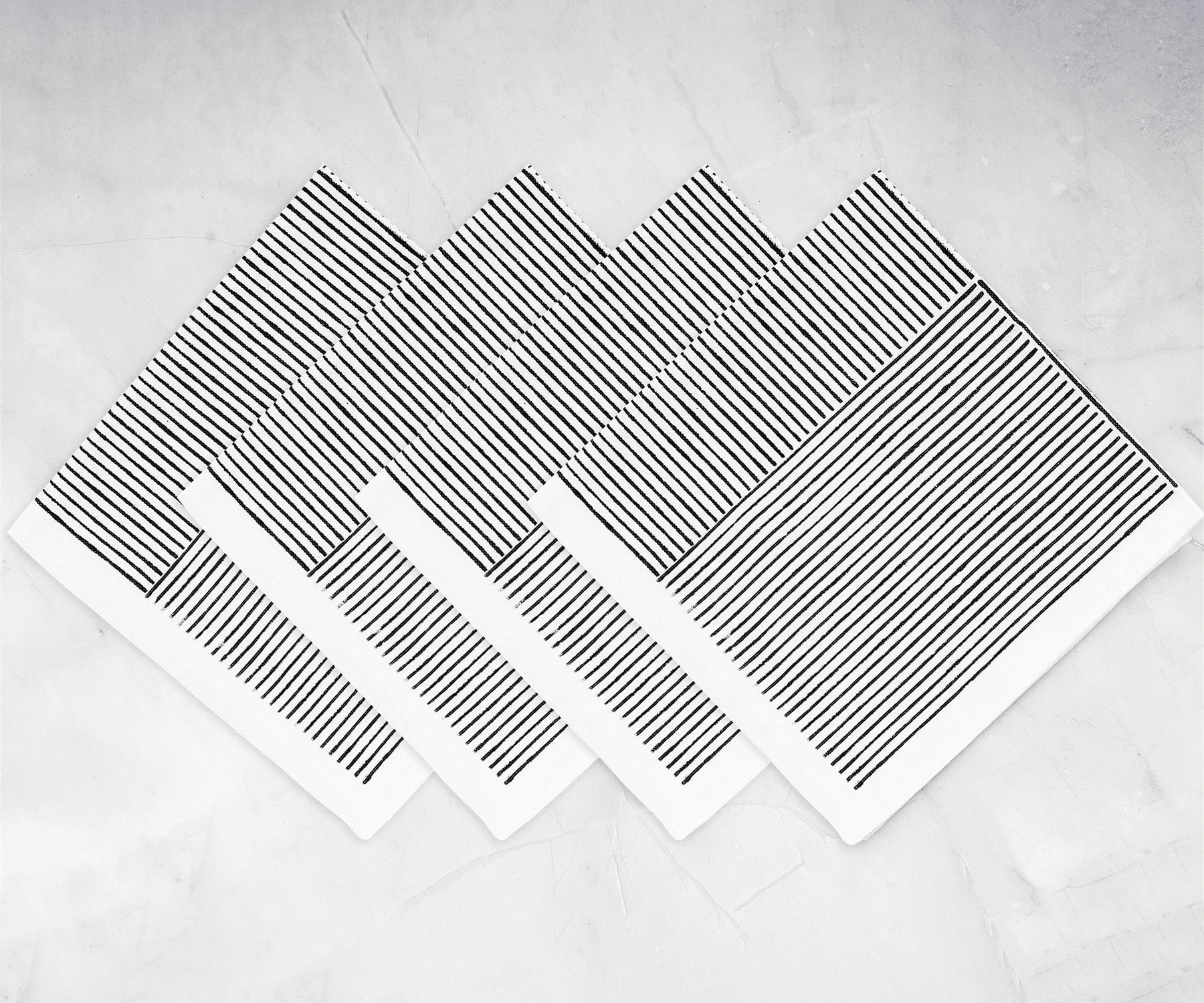 Reusable cloth napkins set styled for a holiday dining table	