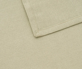 Stylish sage green cotton napkins used for special occasions, parties, and holiday dinners, a practical and reusable alternative to paper napkins