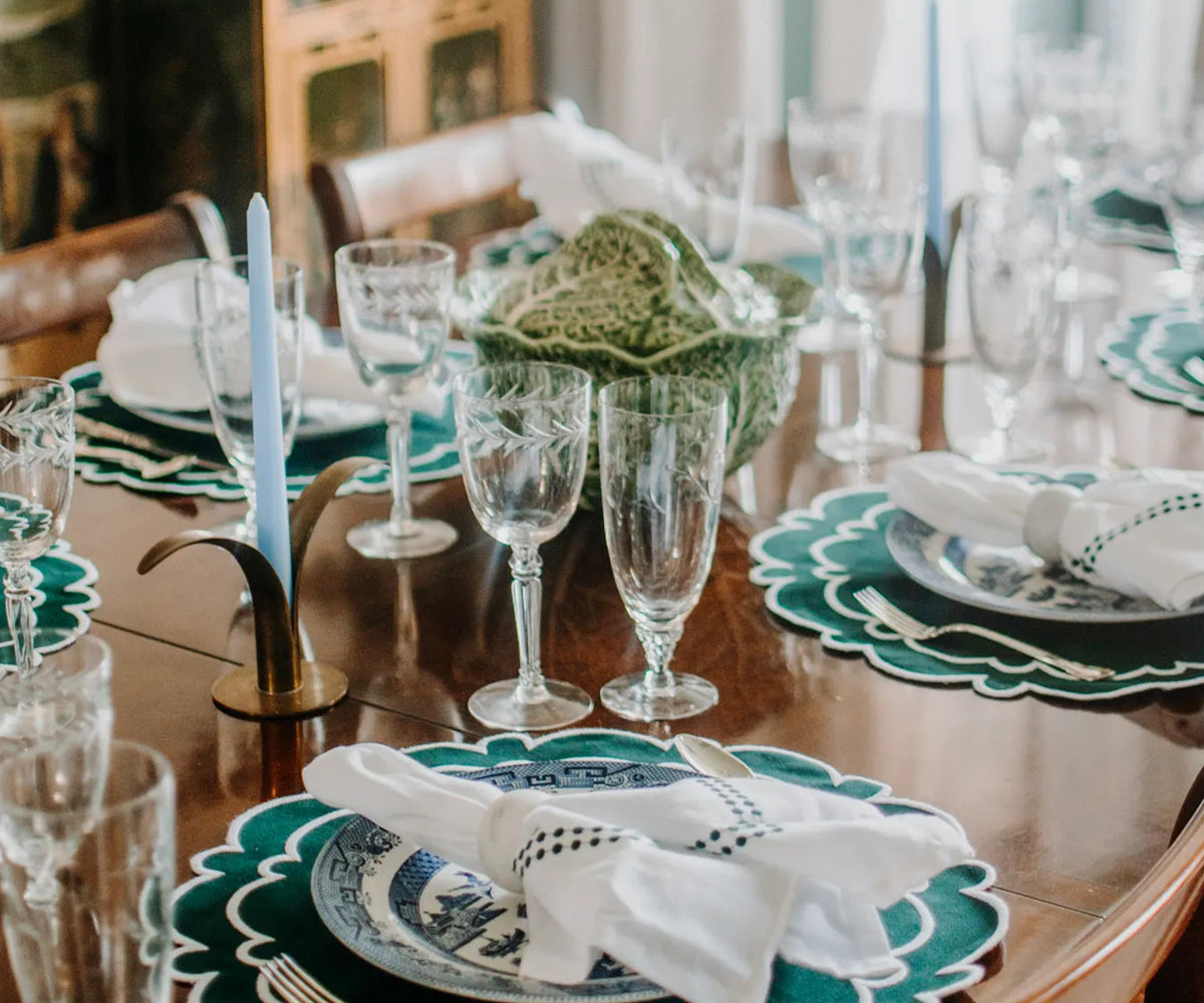 Green scalloped placemats
